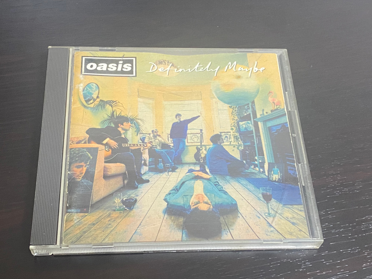 oasis「Definitely Maybe」（オアシス デフィニトリー・メイビー）のジャケット